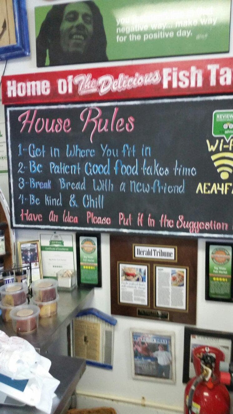 Big Water's hand-painted House Rules, on the wall behind the counter